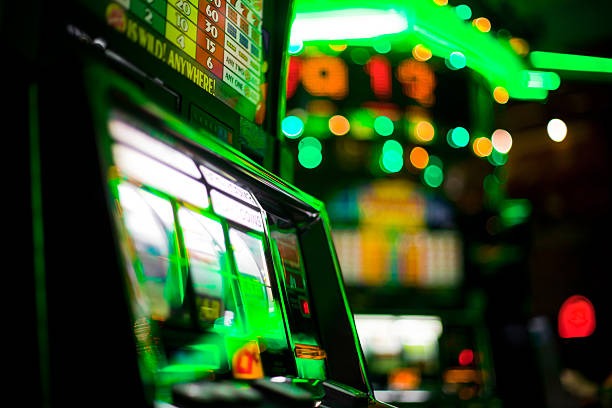 Ganesha Gold slot game interface showing reel layout, paylines, and scatter symbol highlighting